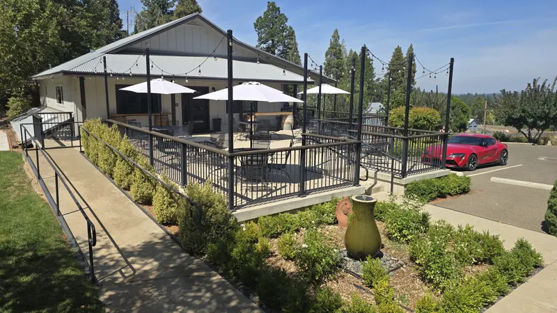 Outdoor patio and deck with string lights at Morton Family Cellars in Apple Hill